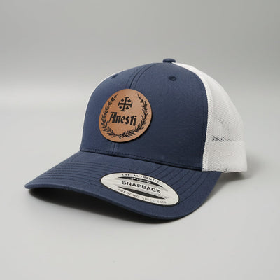 Anesti – Crest Leather Patch Trucker Cap