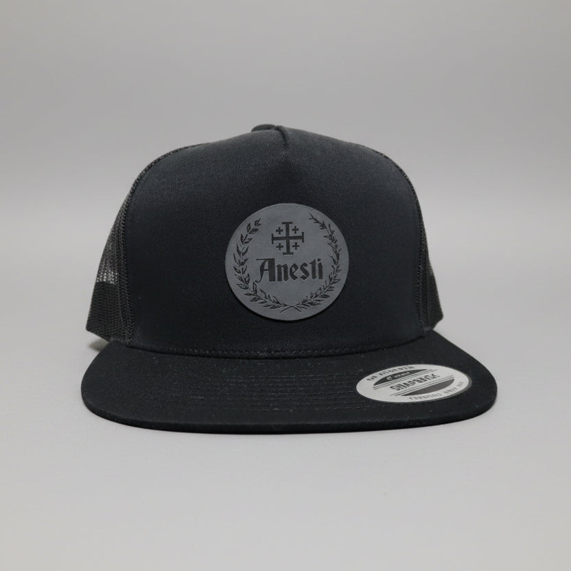 Anesti – Flat Bill Crest Leather Patch Cap (5-Panel)