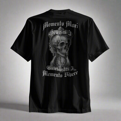 Black t-shirt with skull and text design on a gray background